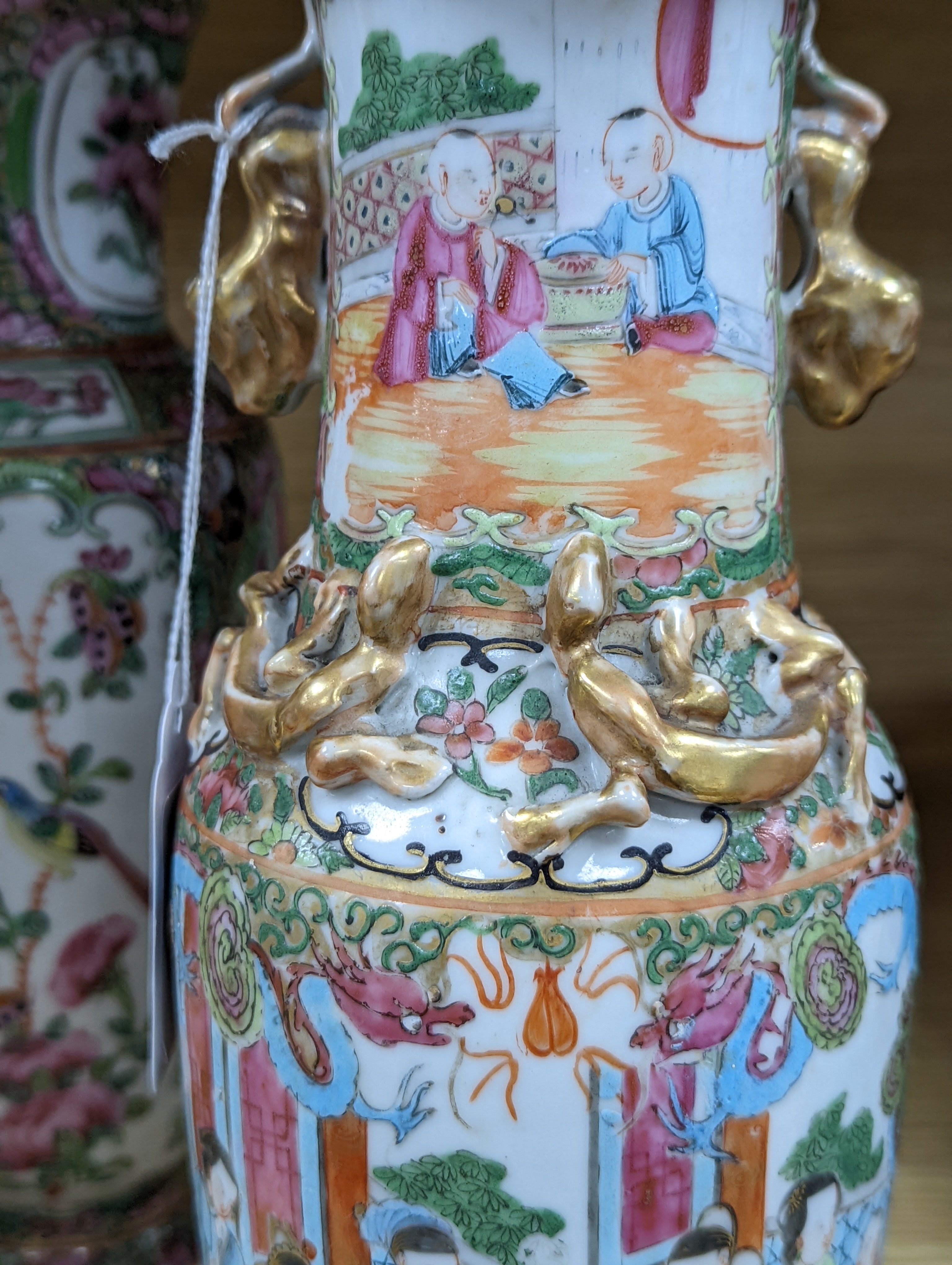 Two Chinese famille rose vases, late 19th century, tallest 26 cm, one wood stand, some restoration